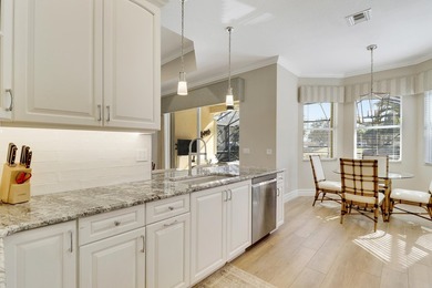 BEAUTIFULLY UPDATED POOL & SPA HOME IN PGA VILLAGE WITH LAKE on PGA Golf Club in PGA Village in Florida - for sale on GolfHomes.com, golf home, golf lot