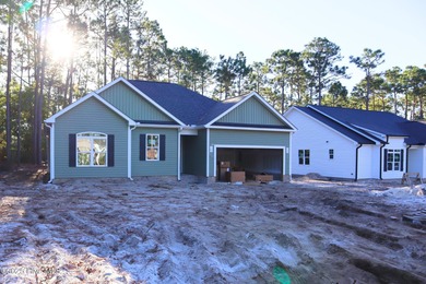 Get ready to fall in love with a home that is thoughtfully on The Lakes Country Club in North Carolina - for sale on GolfHomes.com, golf home, golf lot