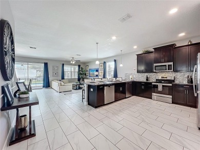Exceptional vacation home, incredible value! Turnkey and fully on The Oasis Club at Champions Gate in Florida - for sale on GolfHomes.com, golf home, golf lot