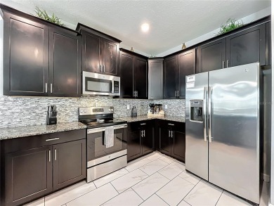 Exceptional vacation home, incredible value! Turnkey and fully on The Oasis Club at Champions Gate in Florida - for sale on GolfHomes.com, golf home, golf lot
