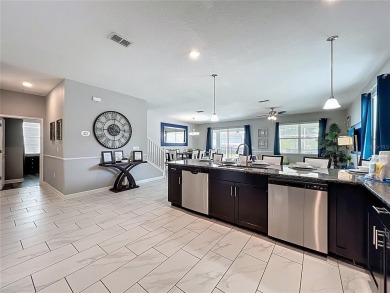 Exceptional vacation home, incredible value! Turnkey and fully on The Oasis Club at Champions Gate in Florida - for sale on GolfHomes.com, golf home, golf lot