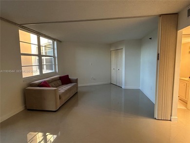 Discover comfort and convenience in this bright 2-bedroom condo on Pembroke Lakes Golf Club in Florida - for sale on GolfHomes.com, golf home, golf lot