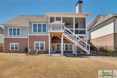 Experience the epitome of luxury living at 908 Indigo Bunting on The Georgia Club in Georgia - for sale on GolfHomes.com, golf home, golf lot