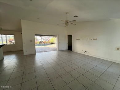 3-bedroom, 2-bath, 2-car garage pool home set on a wide on Del Tura Golf and Country Club in Florida - for sale on GolfHomes.com, golf home, golf lot