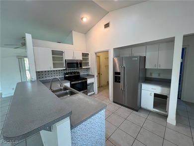 3-bedroom, 2-bath, 2-car garage pool home set on a wide on Del Tura Golf and Country Club in Florida - for sale on GolfHomes.com, golf home, golf lot