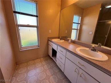 3-bedroom, 2-bath, 2-car garage pool home set on a wide on Del Tura Golf and Country Club in Florida - for sale on GolfHomes.com, golf home, golf lot