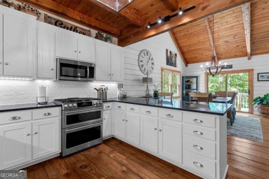 A tastefully and fully renovated home, located on a rushing on Bent Tree Golf Course in Georgia - for sale on GolfHomes.com, golf home, golf lot