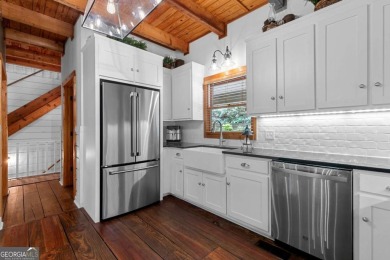 A tastefully and fully renovated home, located on a rushing on Bent Tree Golf Course in Georgia - for sale on GolfHomes.com, golf home, golf lot