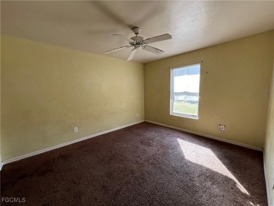 3-bedroom, 2-bath, 2-car garage pool home set on a wide on Del Tura Golf and Country Club in Florida - for sale on GolfHomes.com, golf home, golf lot