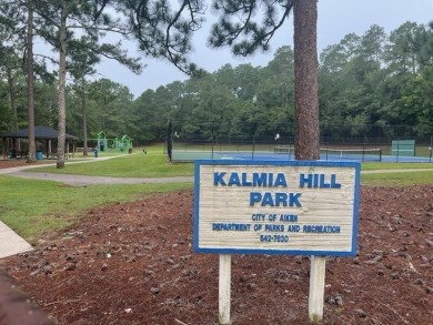 Tucked away in a park-like neighborhood, this charming brick on The Aiken Golf Club in South Carolina - for sale on GolfHomes.com, golf home, golf lot