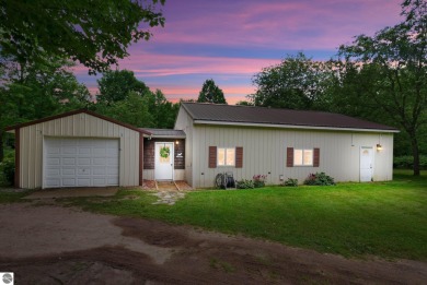 Nestled in an idyllic setting, this Barndominium home boasts on Lakes of the North Deer Run Golf Course in Michigan - for sale on GolfHomes.com, golf home, golf lot