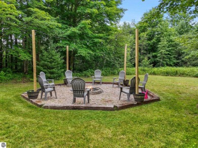 Nestled in an idyllic setting, this Barndominium home boasts on Lakes of the North Deer Run Golf Course in Michigan - for sale on GolfHomes.com, golf home, golf lot