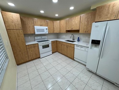 Exceptional opportunity to acquire a spacious 3-bedroom on Palm-Aire Country Club and Resort - Palms in Florida - for sale on GolfHomes.com, golf home, golf lot