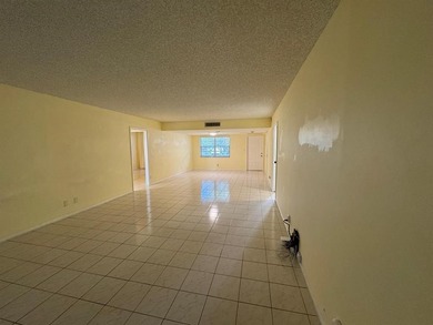 Exceptional opportunity to acquire a spacious 3-bedroom on Palm-Aire Country Club and Resort - Palms in Florida - for sale on GolfHomes.com, golf home, golf lot