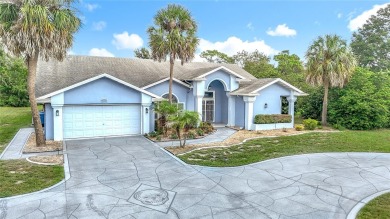 Discover your dream home at 9529 Northcliffe Blvd, Spring Hill on Oak Hills Country Club in Florida - for sale on GolfHomes.com, golf home, golf lot