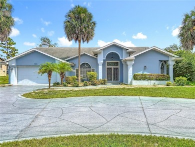 Discover your dream home at 9529 Northcliffe Blvd, Spring Hill on Oak Hills Country Club in Florida - for sale on GolfHomes.com, golf home, golf lot