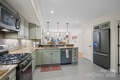 Spectacular freestanding villa perched on a private, gorgeous on Kenmure Country Club in North Carolina - for sale on GolfHomes.com, golf home, golf lot