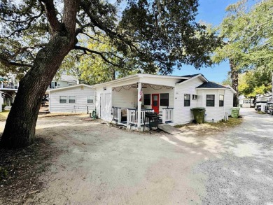 QUAINT 2 BED/2 BATH BEACH HOUSE CENTRALLY LOCATED IN THE HEART on Prestwick Country Club in South Carolina - for sale on GolfHomes.com, golf home, golf lot