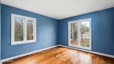 Dreaming of golf front living at it's best? Don't miss out on on Whispering Pines Golf Course in North Carolina - for sale on GolfHomes.com, golf home, golf lot