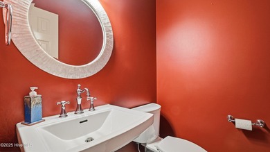 Dreaming of golf front living at it's best? Don't miss out on on Whispering Pines Golf Course in North Carolina - for sale on GolfHomes.com, golf home, golf lot