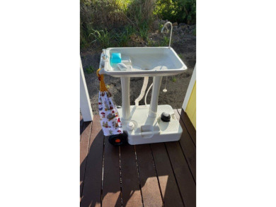 TINY HOUSE ON 20,000 SF LEVEL LOT, OCEAN VIEWS, NEAR GOLF COURSE on Discovery Harbour Golf Course in Hawaii - for sale on GolfHomes.com, golf home, golf lot