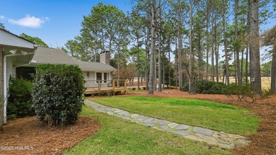 Dreaming of golf front living at it's best? Don't miss out on on Whispering Pines Golf Course in North Carolina - for sale on GolfHomes.com, golf home, golf lot