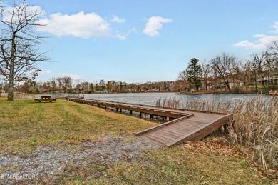 Welcome home to this inviting 3-bedroom, 2-bath split-bedroom on Druid Hills Golf Club in Tennessee - for sale on GolfHomes.com, golf home, golf lot