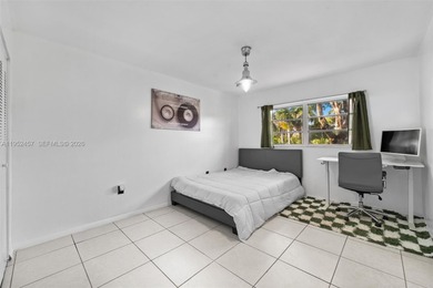 Hidden gem alert! Welcome to this spacious 2-bed, 2-bath on Miami Beach Golf Club in Florida - for sale on GolfHomes.com, golf home, golf lot