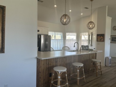 Want a COOL LAKE VIEW? Look at this! The home is so cute, one on Slick Rock Golf Course - Horseshoe Bay in Texas - for sale on GolfHomes.com, golf home, golf lot