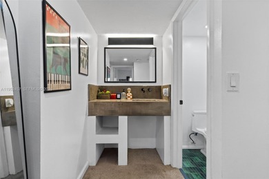 Hidden gem alert! Welcome to this spacious 2-bed, 2-bath on Miami Beach Golf Club in Florida - for sale on GolfHomes.com, golf home, golf lot