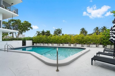 Hidden gem alert! Welcome to this spacious 2-bed, 2-bath on Miami Beach Golf Club in Florida - for sale on GolfHomes.com, golf home, golf lot