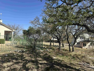 Want a COOL LAKE VIEW? Look at this! The home is so cute, one on Slick Rock Golf Course - Horseshoe Bay in Texas - for sale on GolfHomes.com, golf home, golf lot