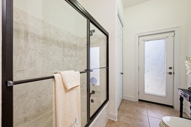 Experience luxury living in this exquisite custom-built Hidden on The Club At Hidden Creek in Florida - for sale on GolfHomes.com, golf home, golf lot