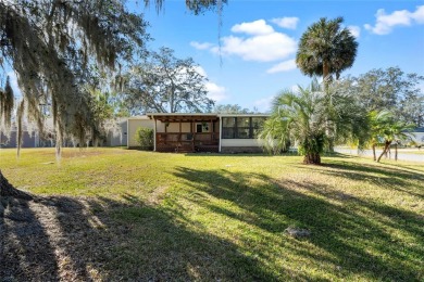 Charming  Affordable Cottage Retreat! This delightful home sits on Plantation Golf Club in Florida - for sale on GolfHomes.com, golf home, golf lot