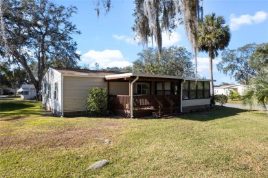 Charming  Affordable Cottage Retreat! This delightful home sits on Plantation Golf Club in Florida - for sale on GolfHomes.com, golf home, golf lot