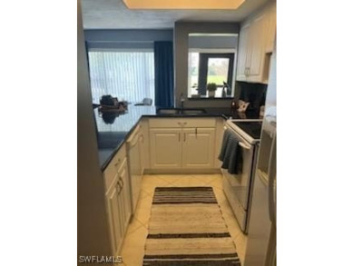 this unit has completely been updated with granite countertops on Hideaway Country Club in Florida - for sale on GolfHomes.com, golf home, golf lot