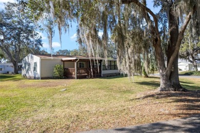 Charming  Affordable Cottage Retreat! This delightful home sits on Plantation Golf Club in Florida - for sale on GolfHomes.com, golf home, golf lot