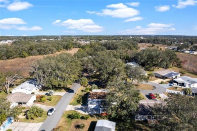 Charming  Affordable Cottage Retreat! This delightful home sits on Plantation Golf Club in Florida - for sale on GolfHomes.com, golf home, golf lot