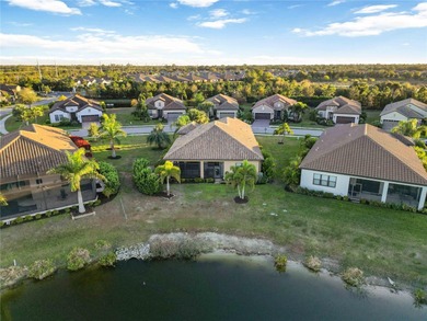 If you've been waiting for the right lakefront home at the right on Boca Royale Golf and Country Club in Florida - for sale on GolfHomes.com, golf home, golf lot