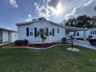 Welcome to your perfect Florida oasis with panoramic golf course on Schalamar Creek Golf and Country Club in Florida - for sale on GolfHomes.com, golf home, golf lot