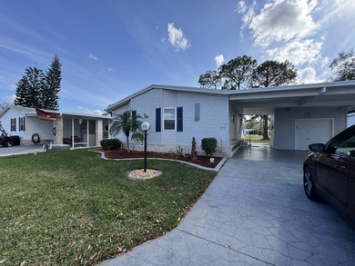 Welcome to your perfect Florida oasis with panoramic golf course on Schalamar Creek Golf and Country Club in Florida - for sale on GolfHomes.com, golf home, golf lot