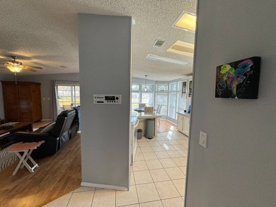 Welcome to your perfect Florida oasis with panoramic golf course on Schalamar Creek Golf and Country Club in Florida - for sale on GolfHomes.com, golf home, golf lot