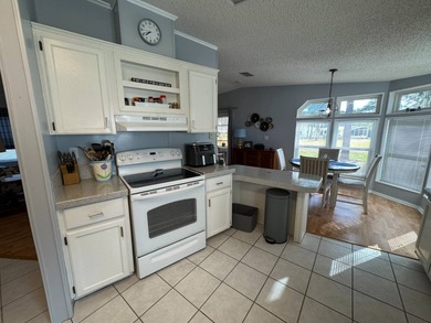 Welcome to your perfect Florida oasis with panoramic golf course on Schalamar Creek Golf and Country Club in Florida - for sale on GolfHomes.com, golf home, golf lot