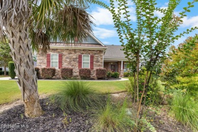 This exceptional residence, located within the esteemed Compass on Compass Pointe Golf Course in North Carolina - for sale on GolfHomes.com, golf home, golf lot