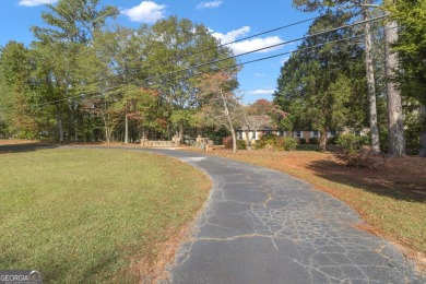 Priced below appraised value! Charming 4-sided brick home on Canongate Golf Club in Georgia - for sale on GolfHomes.com, golf home, golf lot