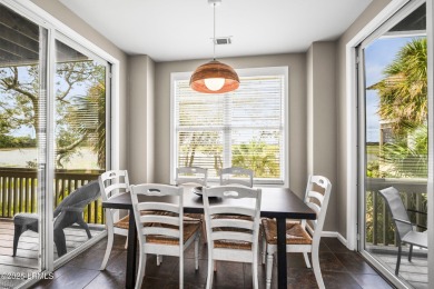 Located on the serene salt marsh with sweeping deep-water views on Ocean Creek Golf Course in South Carolina - for sale on GolfHomes.com, golf home, golf lot