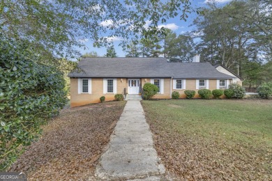 Priced below appraised value! Charming 4-sided brick home on Canongate Golf Club in Georgia - for sale on GolfHomes.com, golf home, golf lot