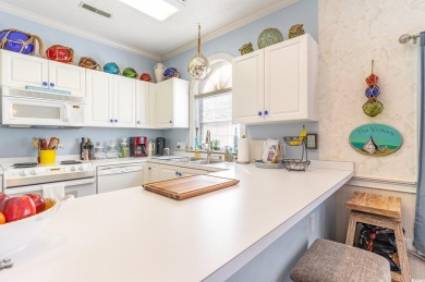 This is a fully-furnished, end-unit, and elevator-access on Myrtlewood Golf Course and Club  in South Carolina - for sale on GolfHomes.com, golf home, golf lot