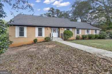 Priced below appraised value! Charming 4-sided brick home on Canongate Golf Club in Georgia - for sale on GolfHomes.com, golf home, golf lot