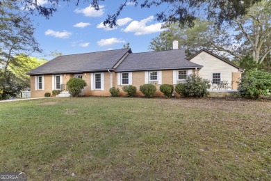 Priced below appraised value! Charming 4-sided brick home on Canongate Golf Club in Georgia - for sale on GolfHomes.com, golf home, golf lot